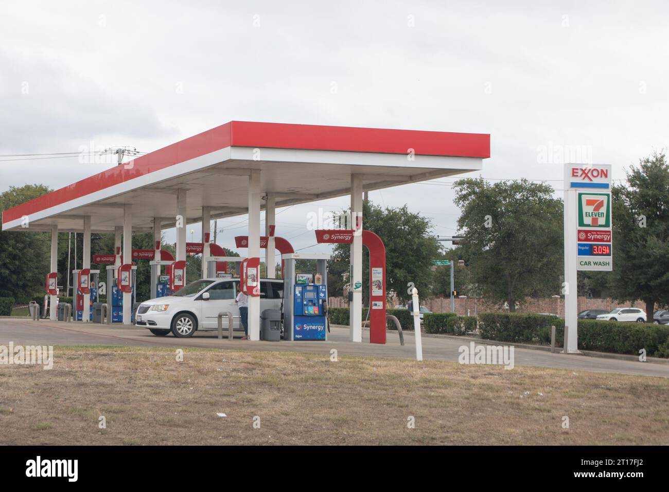 Texas, USA. 11th Oct, 2023. This photo taken on Oct. 11, 2023 shows an Exxon gas station in Plano, on the outskirts of Dallas, Texas, the United States. Exxon Mobil announced Wednesday it was buying Pioneer Natural Resources, a shale drilling firm, for 59.5 billion U.S. dollars, in a bid to expand its oil production in West Texas. Credit: Dan Tian/Xinhua/Alamy Live News Stock Photo