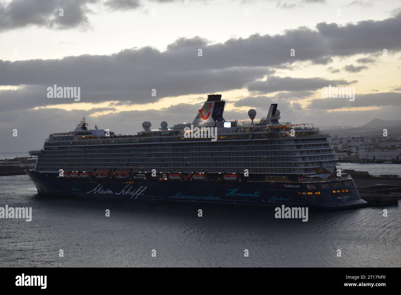 Cruise ship at night in harbour Stock Photo - Alamy