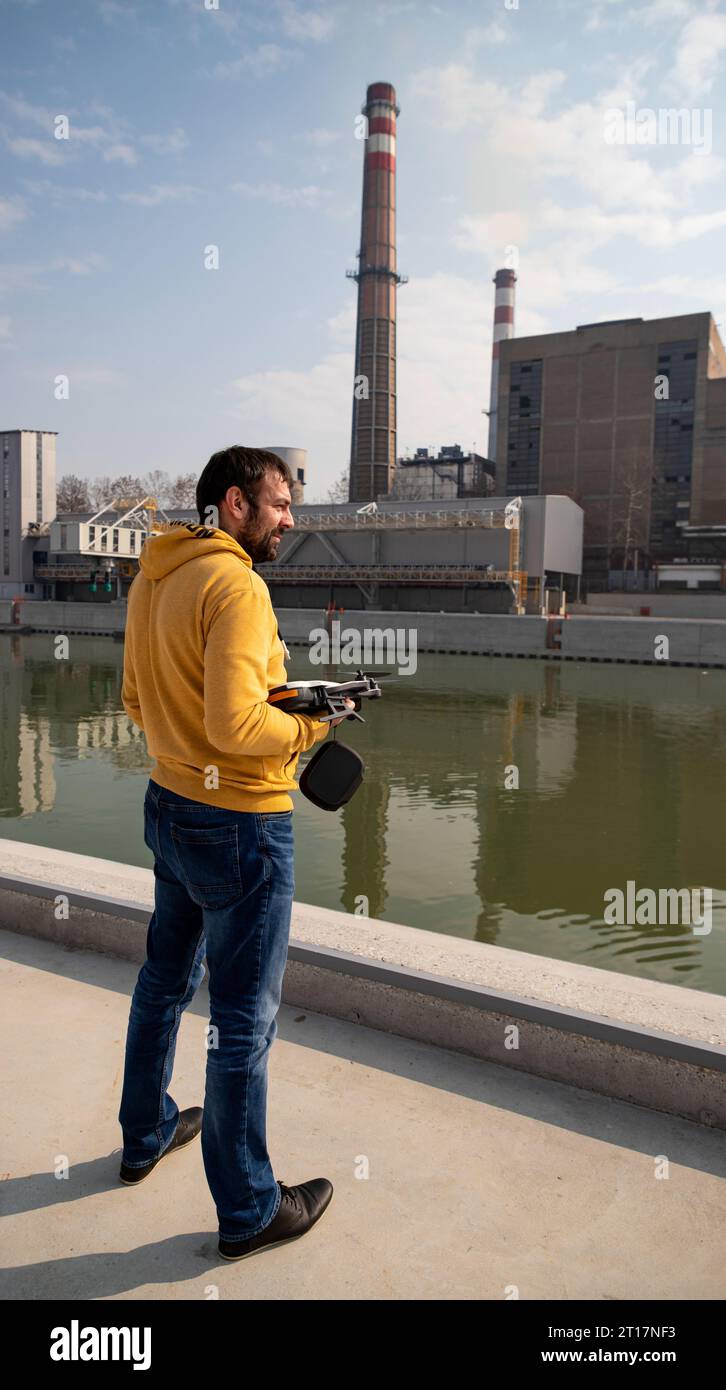 man with the drone on filming location Stock Photo
