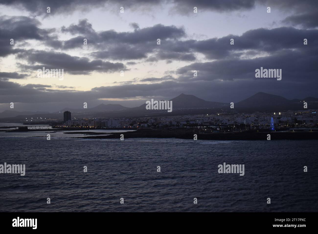 Cruise ship at night in harbour Stock Photo - Alamy