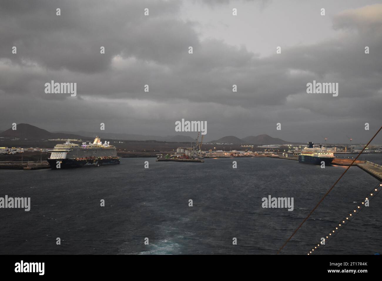 Cruise ship at night in harbour Stock Photo - Alamy
