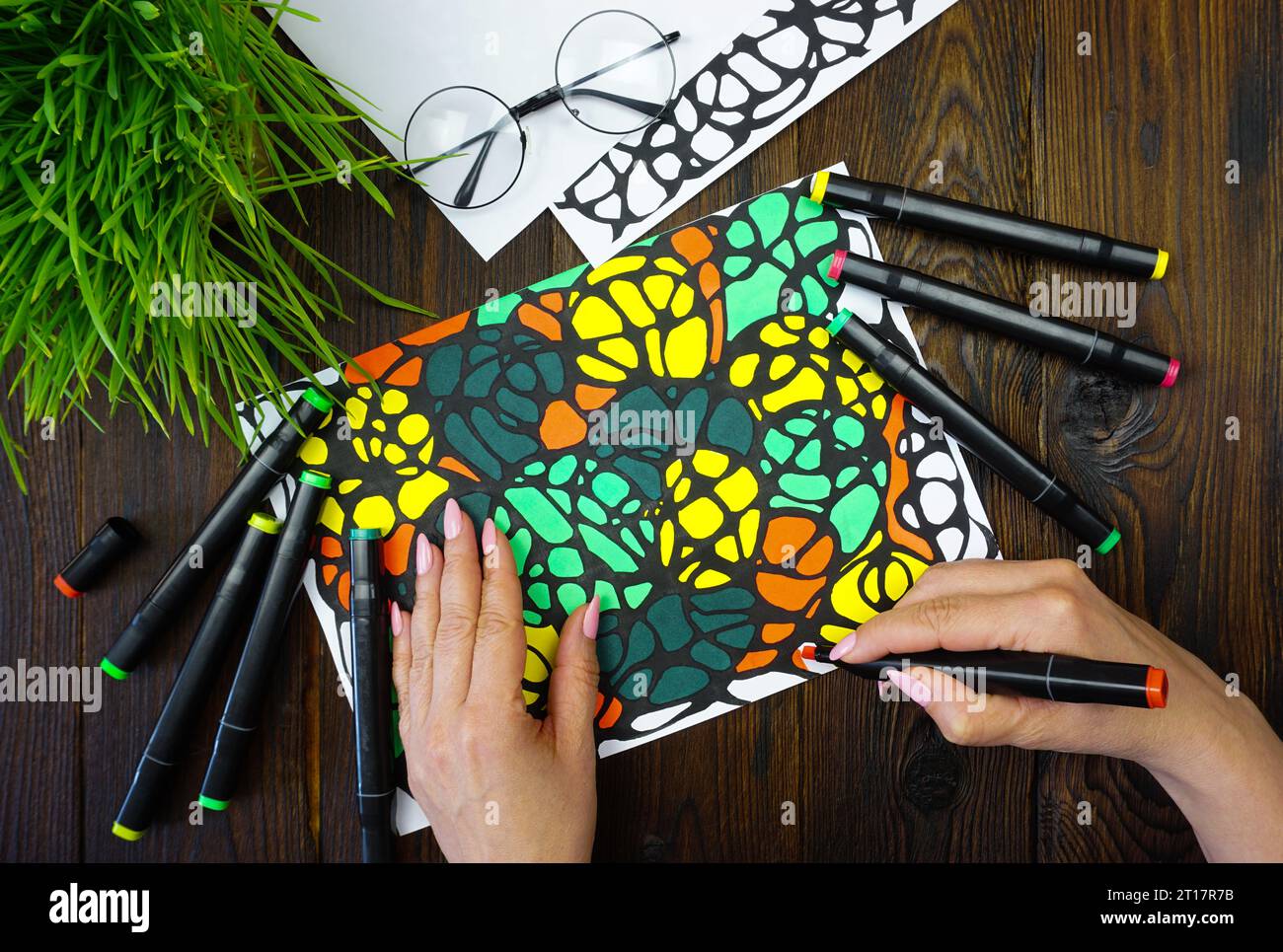 A woman at a psychologist's appointment draws a neuro graphic drawing. High quality photo Stock Photo