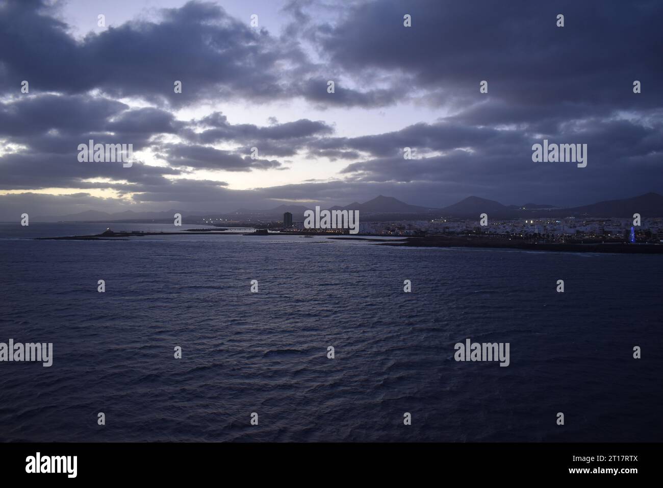 Cruise ship at night in harbour Stock Photo - Alamy