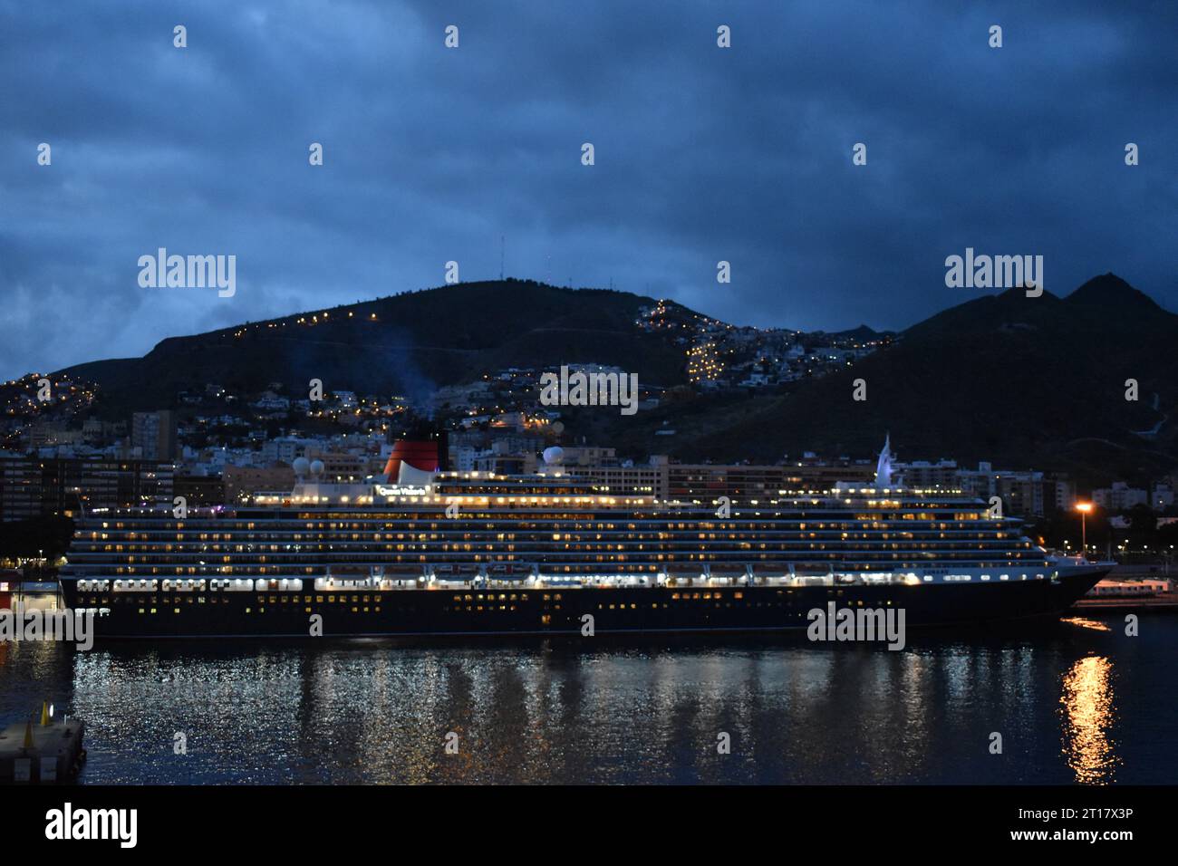 Cruise ship at night in harbour Stock Photo - Alamy