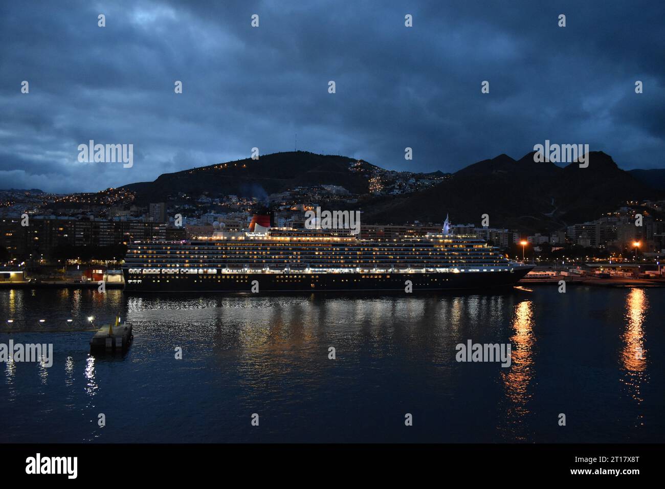 Cruise ship at night in harbour Stock Photo - Alamy