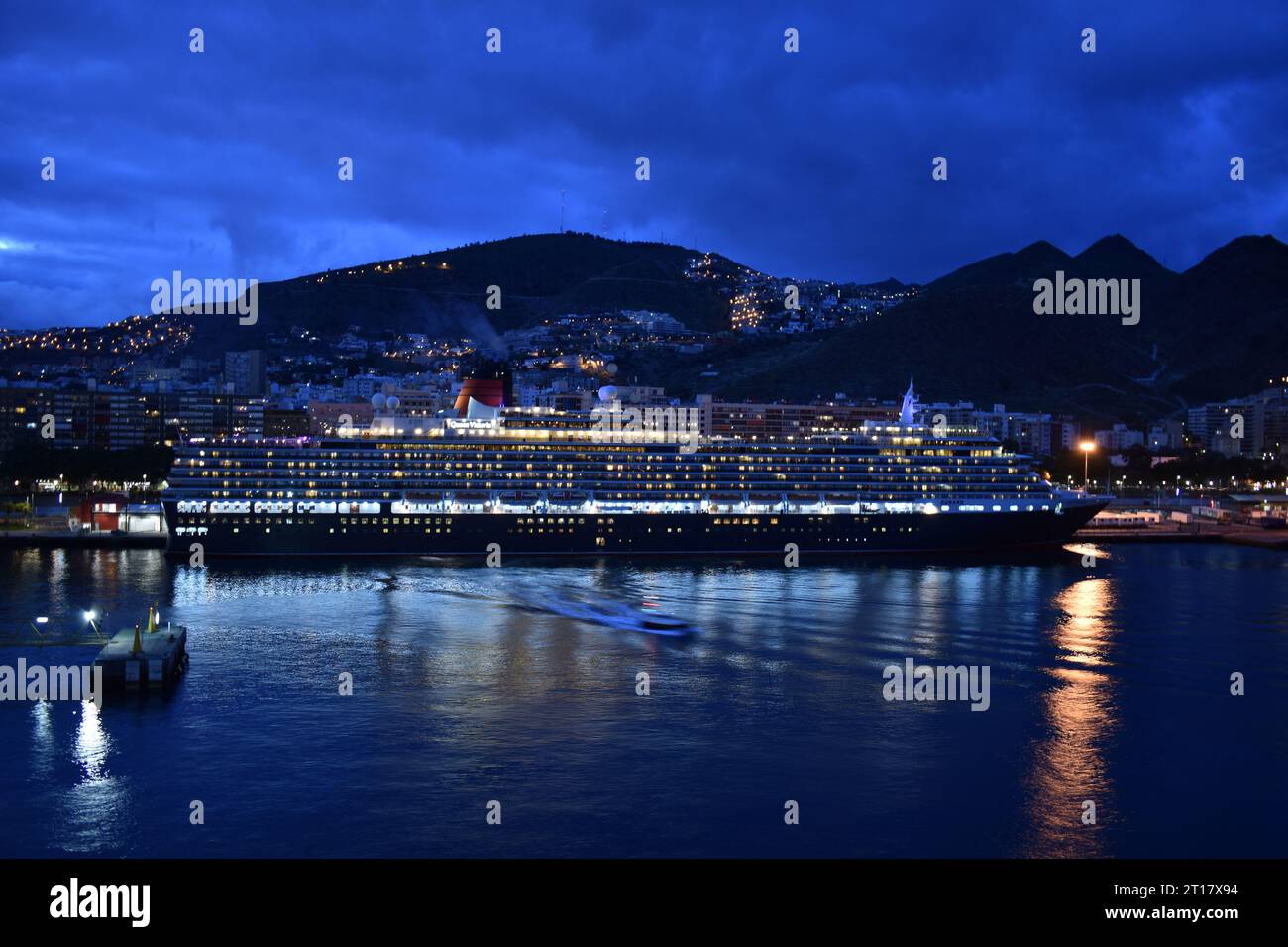 Cruise ship at night in harbour Stock Photo - Alamy