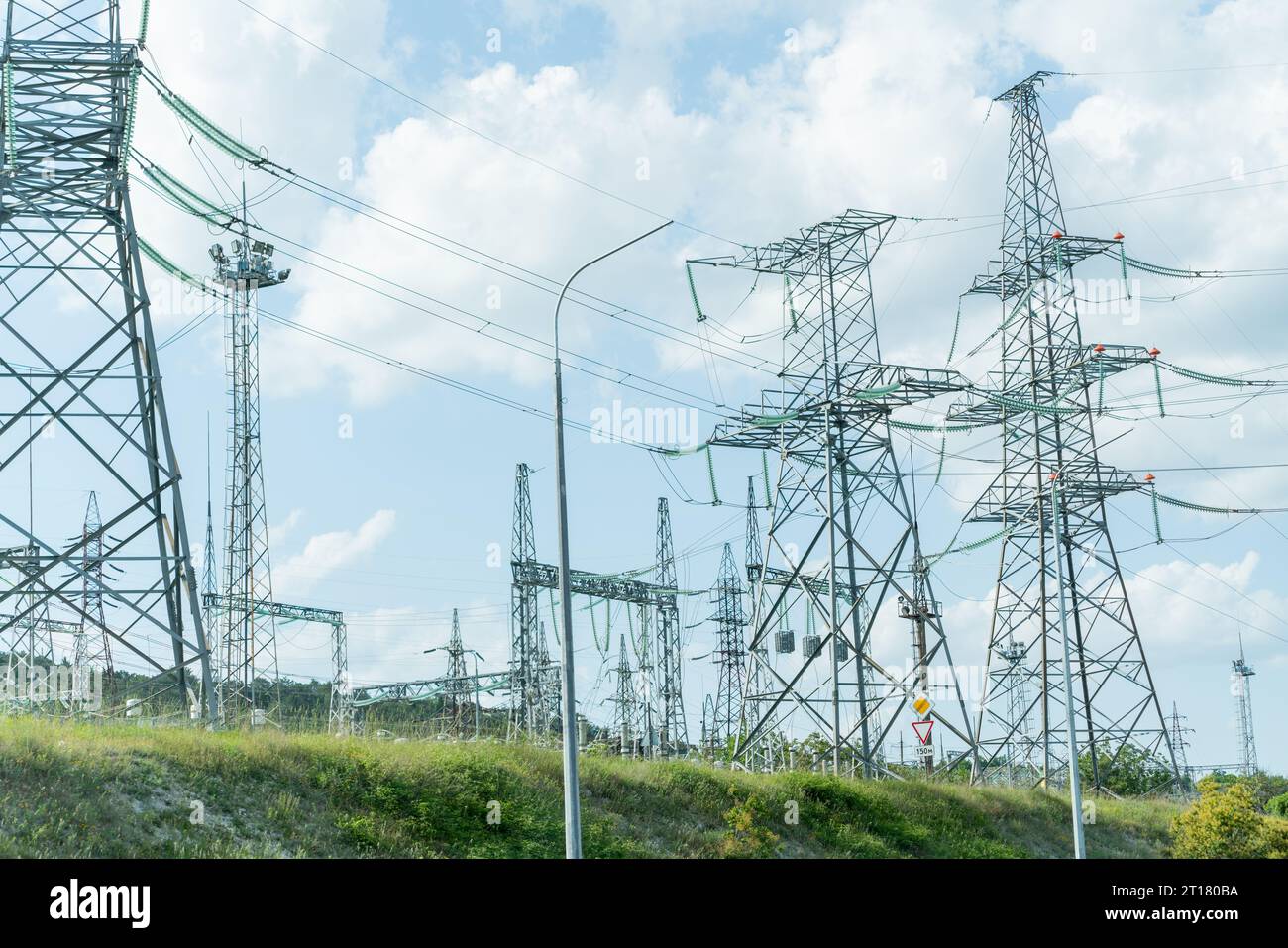High voltage towers with sky background. Power line support with wires ...
