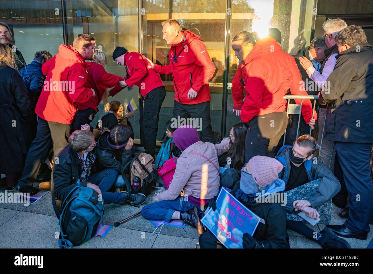 Edinburgh 11th October 2023.  Pro Trans protestors stage demonstration and try to prevent ticket holders entering the venue at Edinburgh University Stock Photo