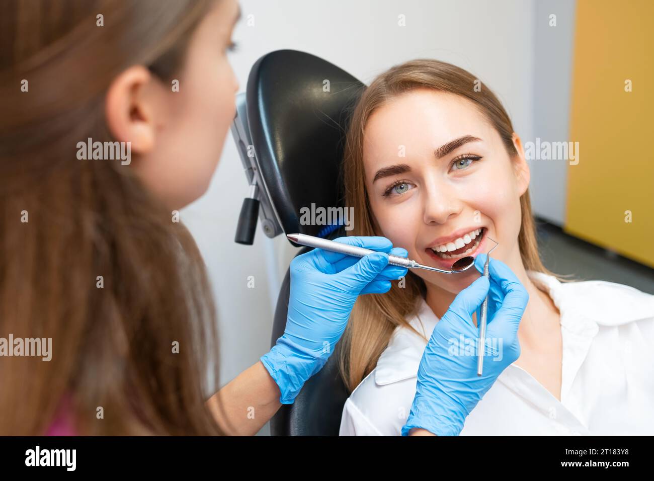 Female patient receiving orthodontic treatment hi-res stock photography ...