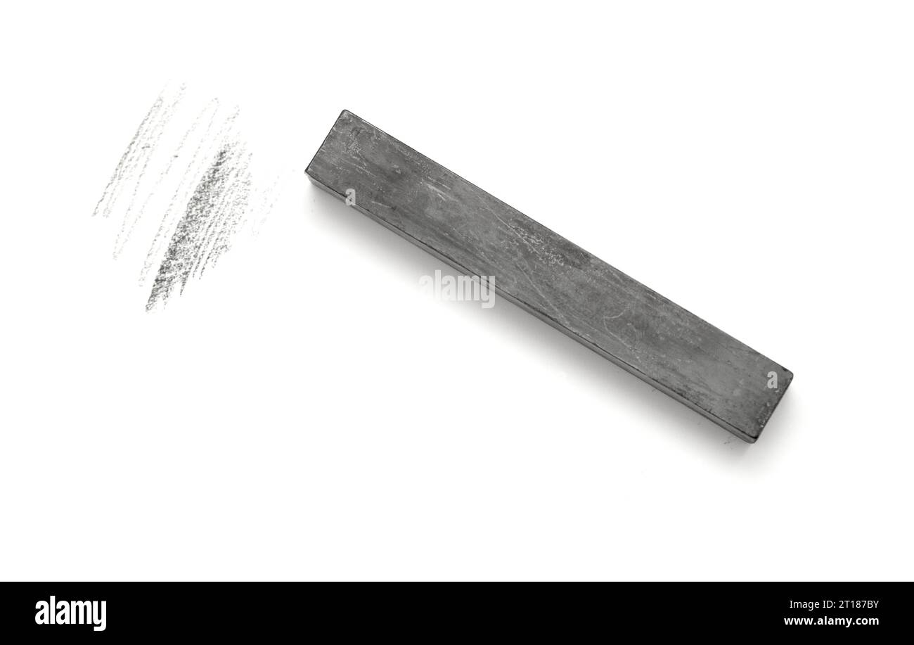 Solid graphite stick art material isolated on white background Stock