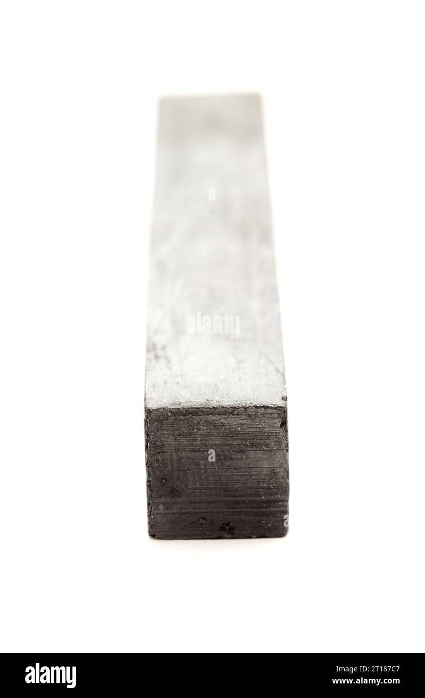 Solid graphite stick art material isolated on white background Stock