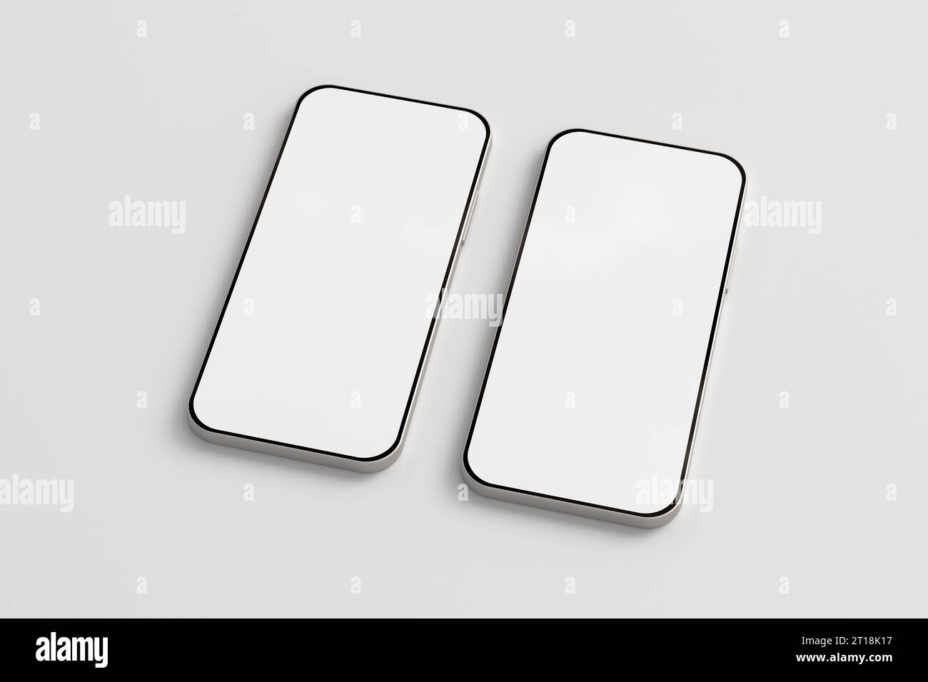 Two blank screen smartphones mockup on white background Stock Photo - Alamy