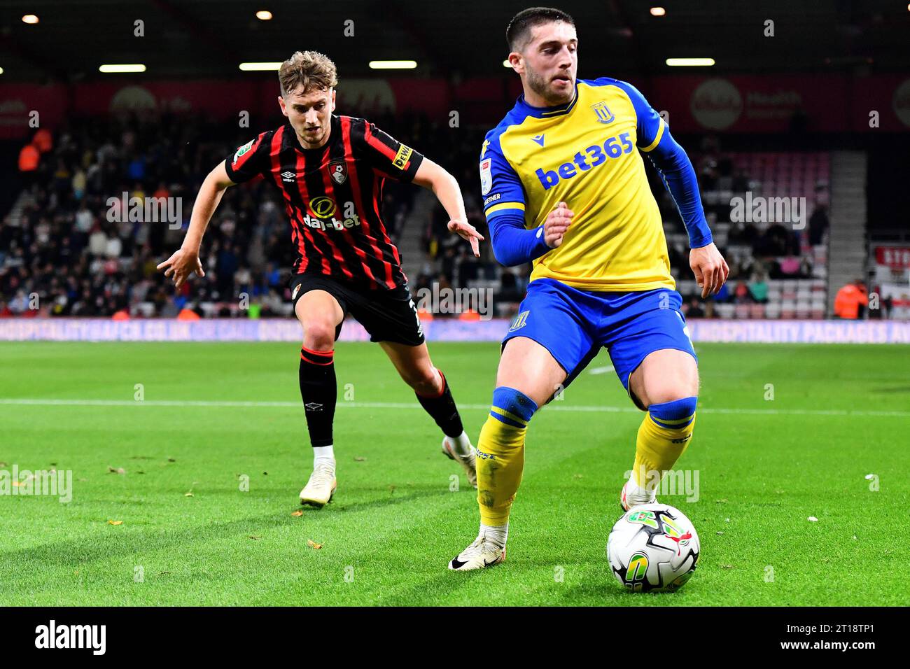David Brooks of AFC Bournemouth and Lynden Gooch of Stoke City AFC