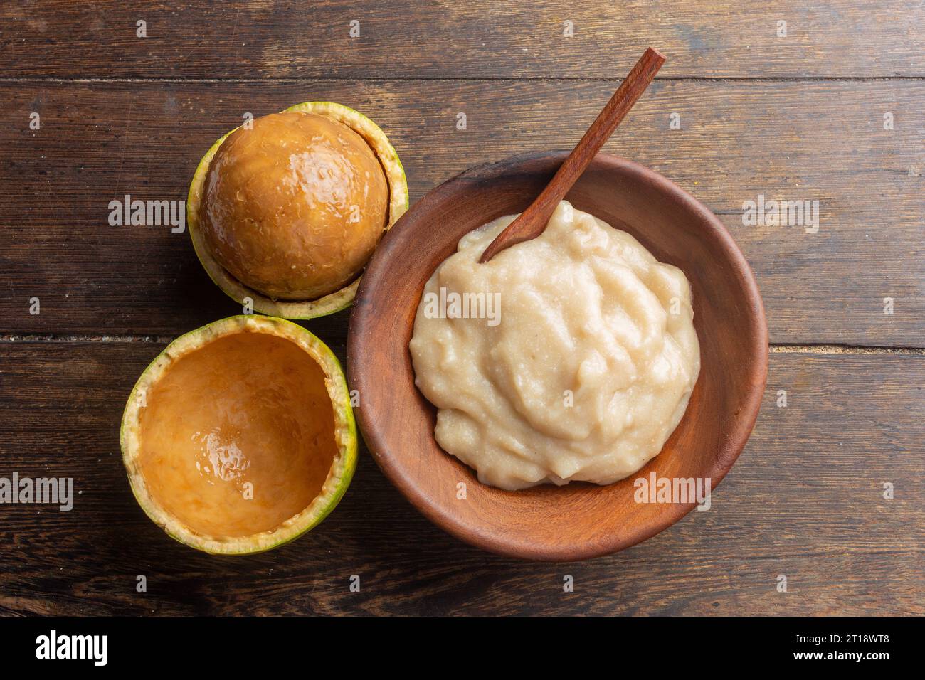 Traditional African cornmeal porridge enriched with Natal orange wild fruit pulp (Strychnos spinosa) served in a bowl Stock Photo