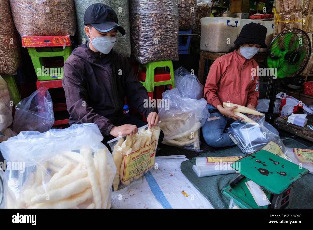Binh Tay Market Scene, Packaging Foodstuff, Ho Chi Minh City, Vietnam. Stock Photo