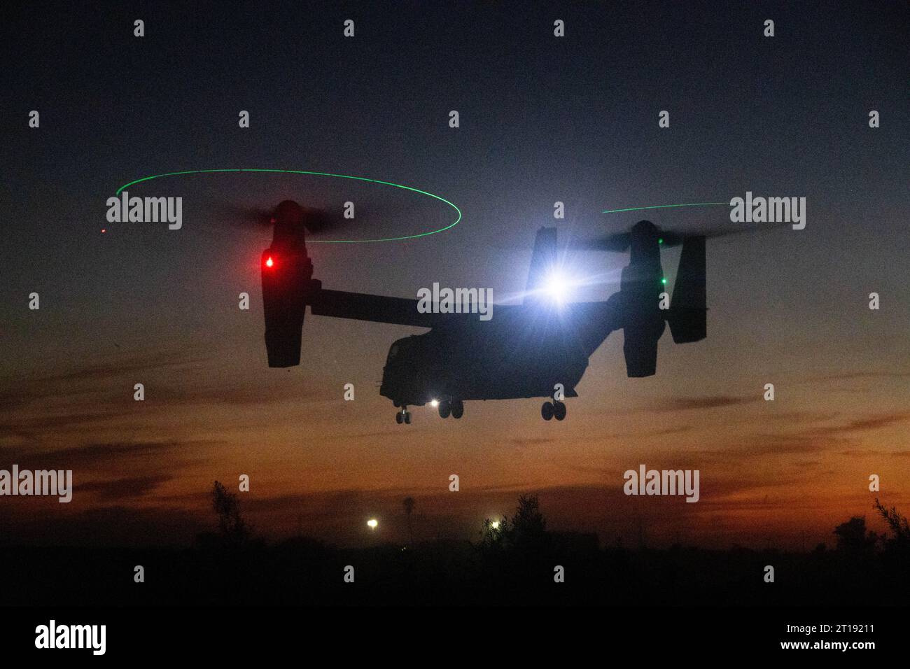 Oceanside, United States. 26 September, 2023. A U.S. Marines MV-22 Osprey tilt-rotor aircraft assigned to Medium Tiltrotor Squadron 164 lifts off at sunset during a joint reconnaissance insertion exercise with the Royal Australian Army at Marine Corps Base Camp Pendleton, September 26, 2023 in Oceanside, California.   Credit: Sgt. Amanda Taylor/U.S. Marine Corps/Alamy Live News Stock Photo