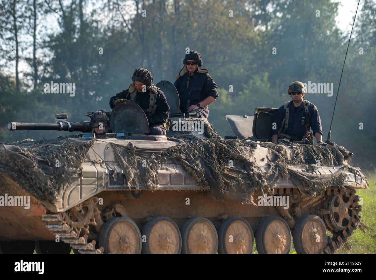 Hohenfels, Germany . 14 September, 2023. Polish Army soldiers ride a tracked armored personnel carrier during Saber Junction 23 at the Joint Multinational Readiness Center, September 14, 2023 near Hohenfels, Germany.  Credit: SFC Michel Sauret/U.S Army/Alamy Live News Stock Photo