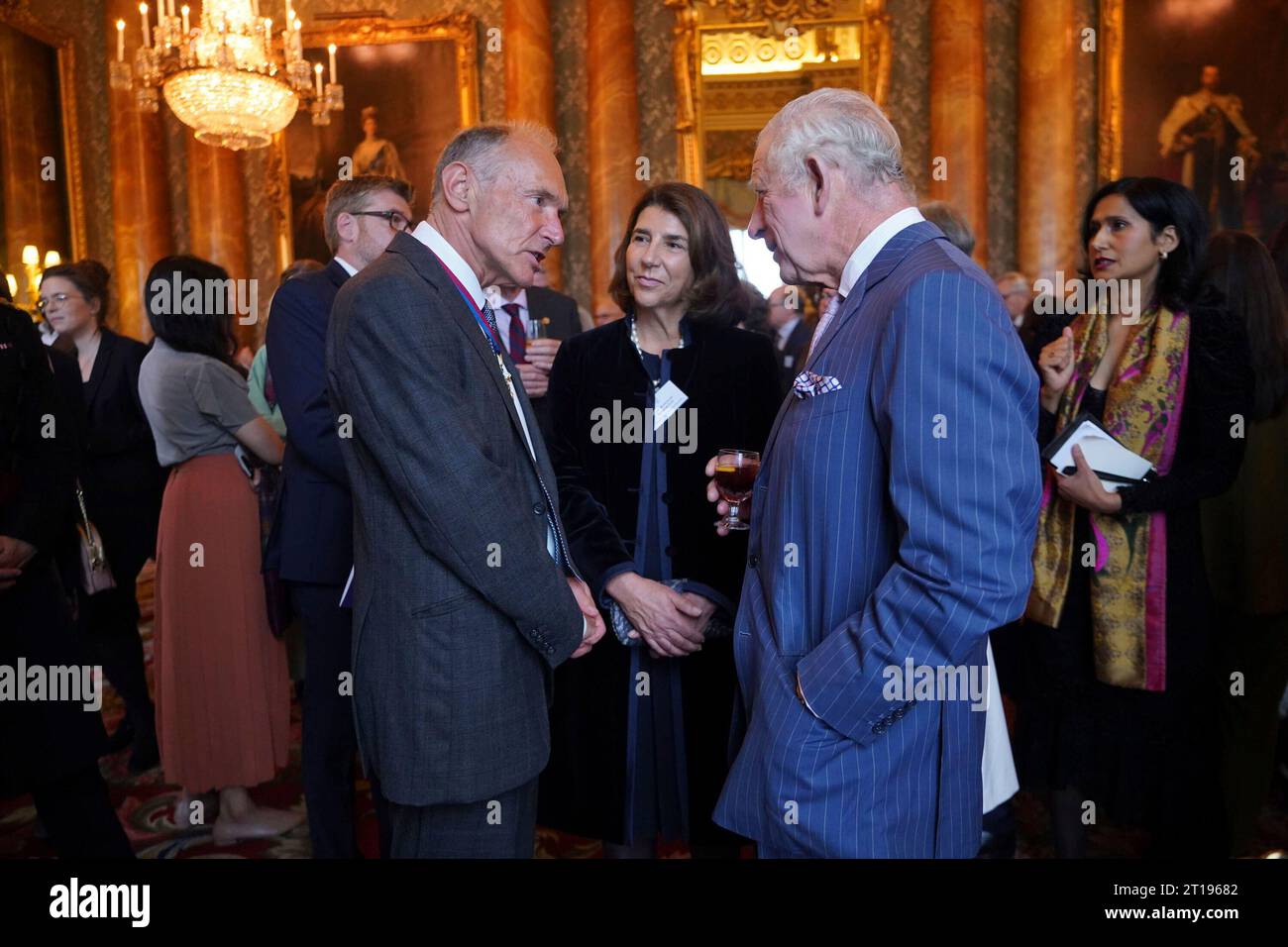 Britain's King Charles III talks to Tim BernersLee and his wife