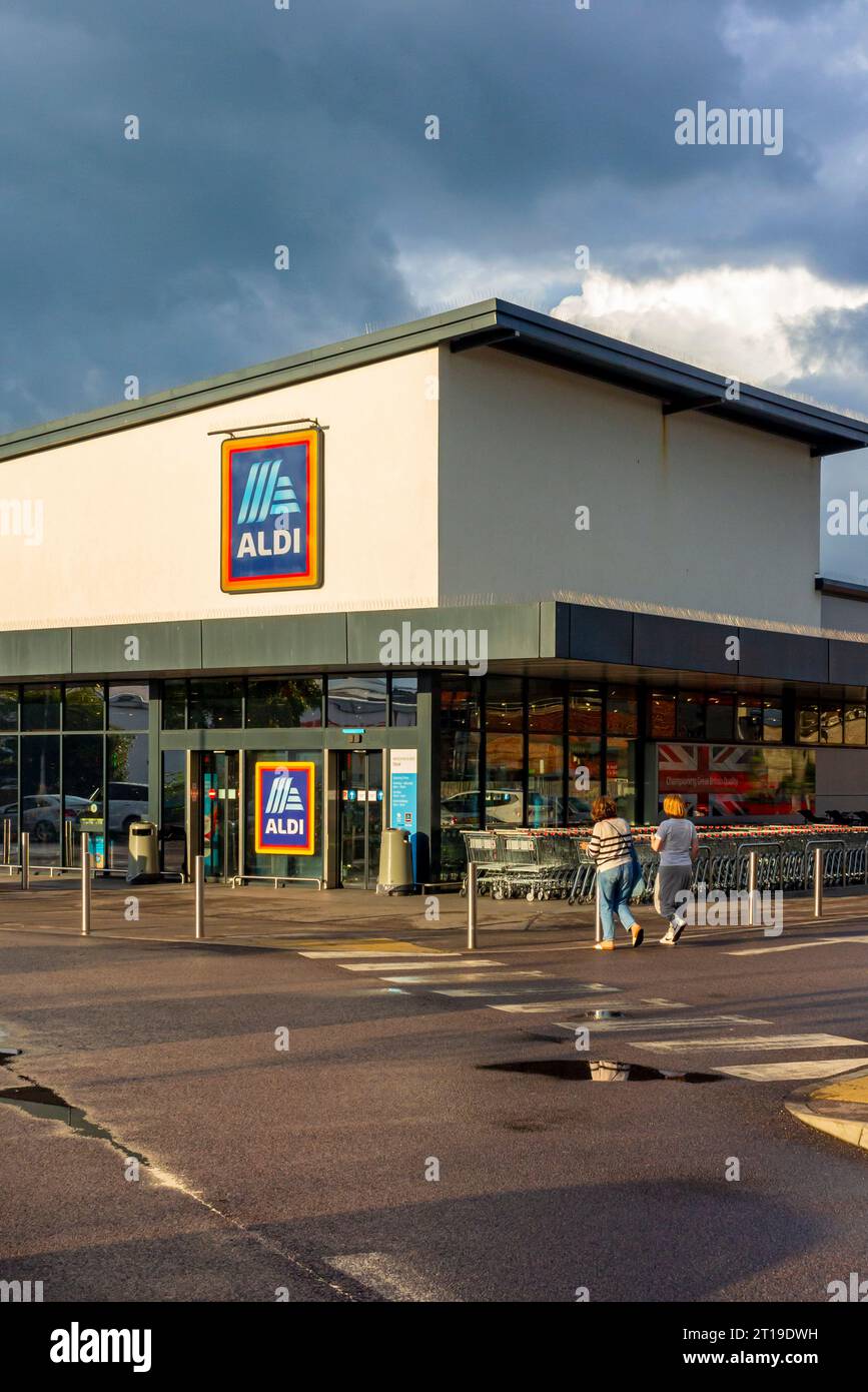 Exterior of Aldi supermarket in Deal Kent England UK with dark sky above. Stock Photo