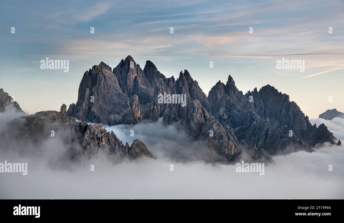 Mountain landscape with fog, at sunset Dolomites Italy Stock Photo - Alamy