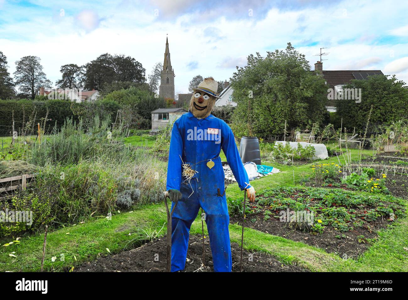 Gardener scarecrow on allotment during village scarecrow festival in Sharnbrook, Bedfordshire, England, UK Stock Photo