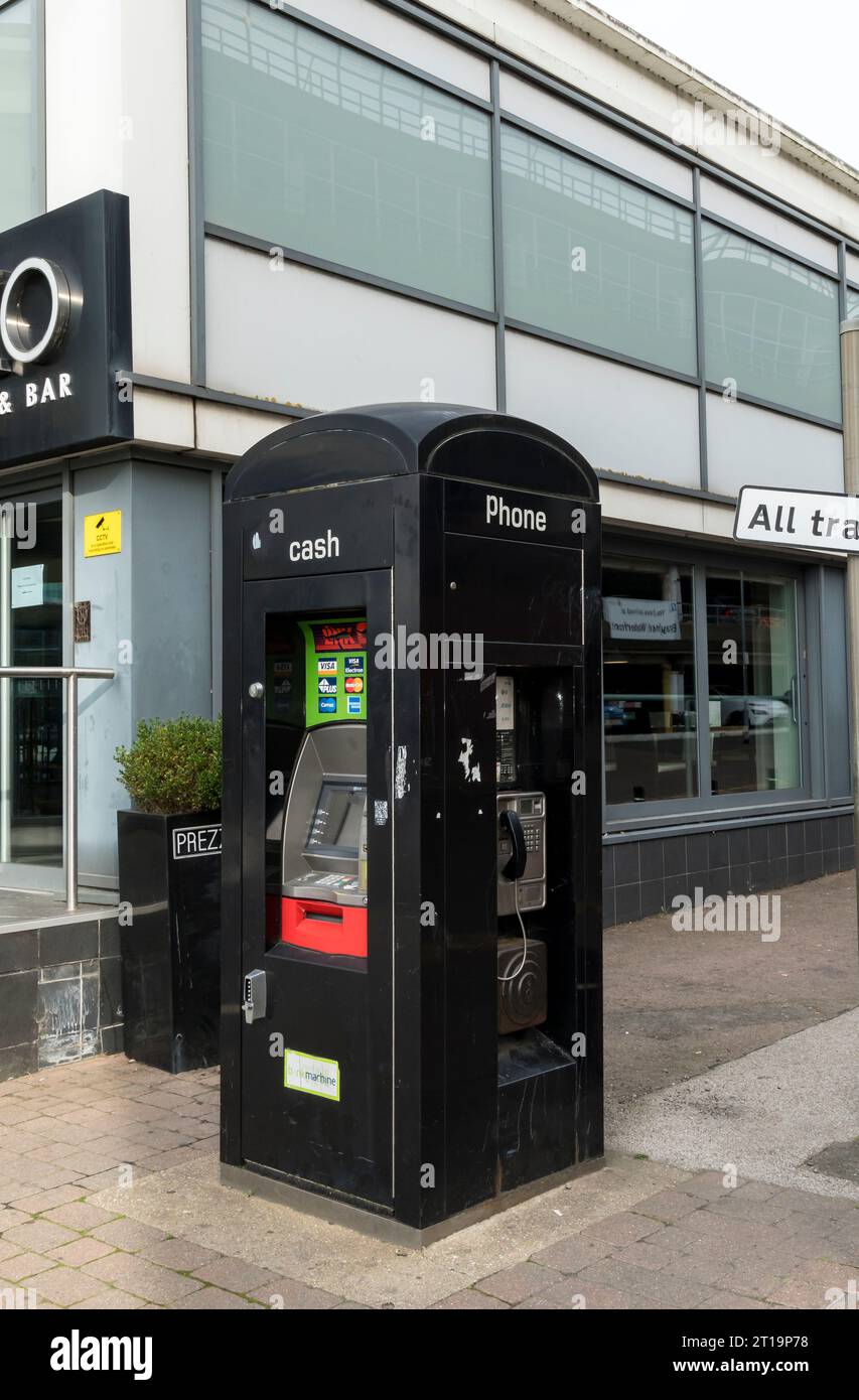 Cash dispenser and Telephone kiosk, Brayford Wharf North, Lincoln City, Lincolnshire, England, UK Stock Photo