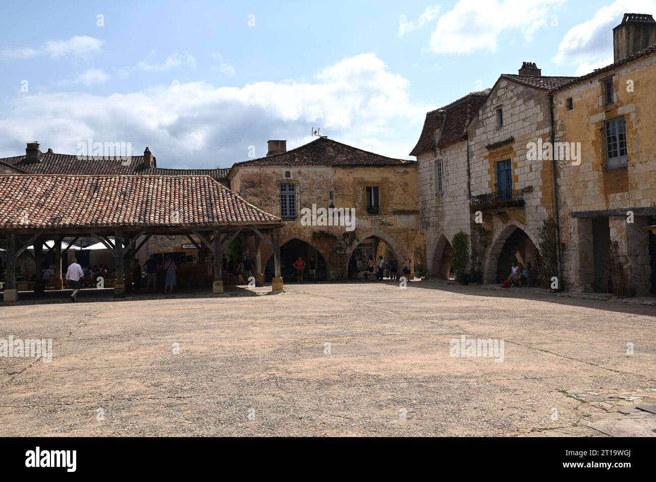 The market square area of the Bastide village of Monpazier in the Dordogne region of France. The bastide was founded in 1284 by Edward1 of England. Stock Photo