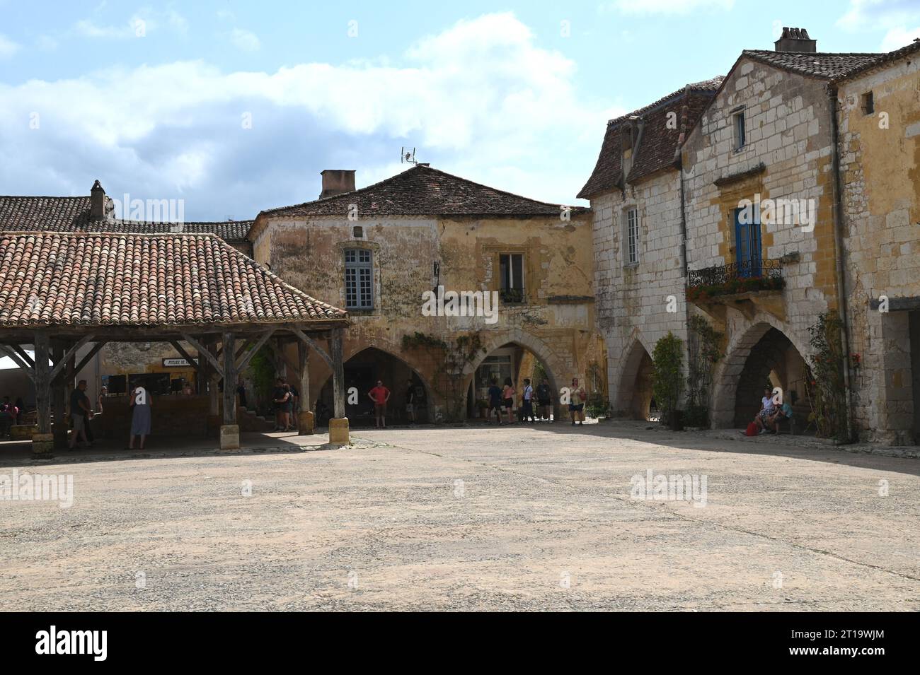 The market square area of the Bastide village of Monpazier in the Dordogne region of France. The bastide was founded in 1284 by Edward1 of England. Stock Photo