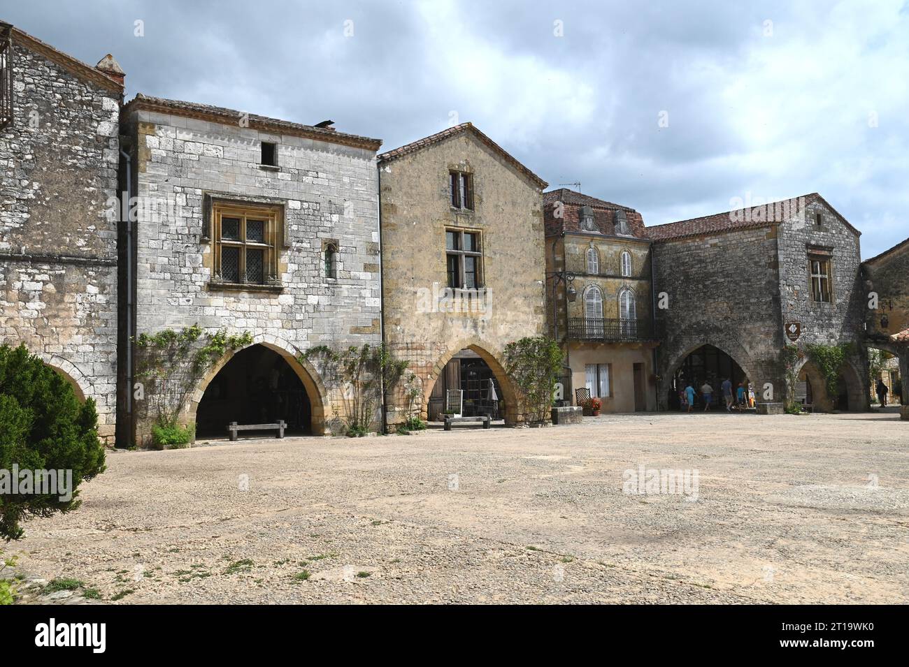The market square area of the Bastide village of Monpazier in the Dordogne region of France. The bastide was founded in 1284 by Edward1 of England. Stock Photo