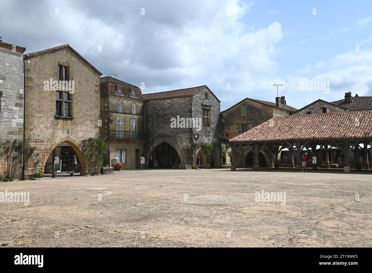 The market square area of the Bastide village of Monpazier in the Dordogne region of France. The bastide was founded in 1284 by Edward1 of England. Stock Photo