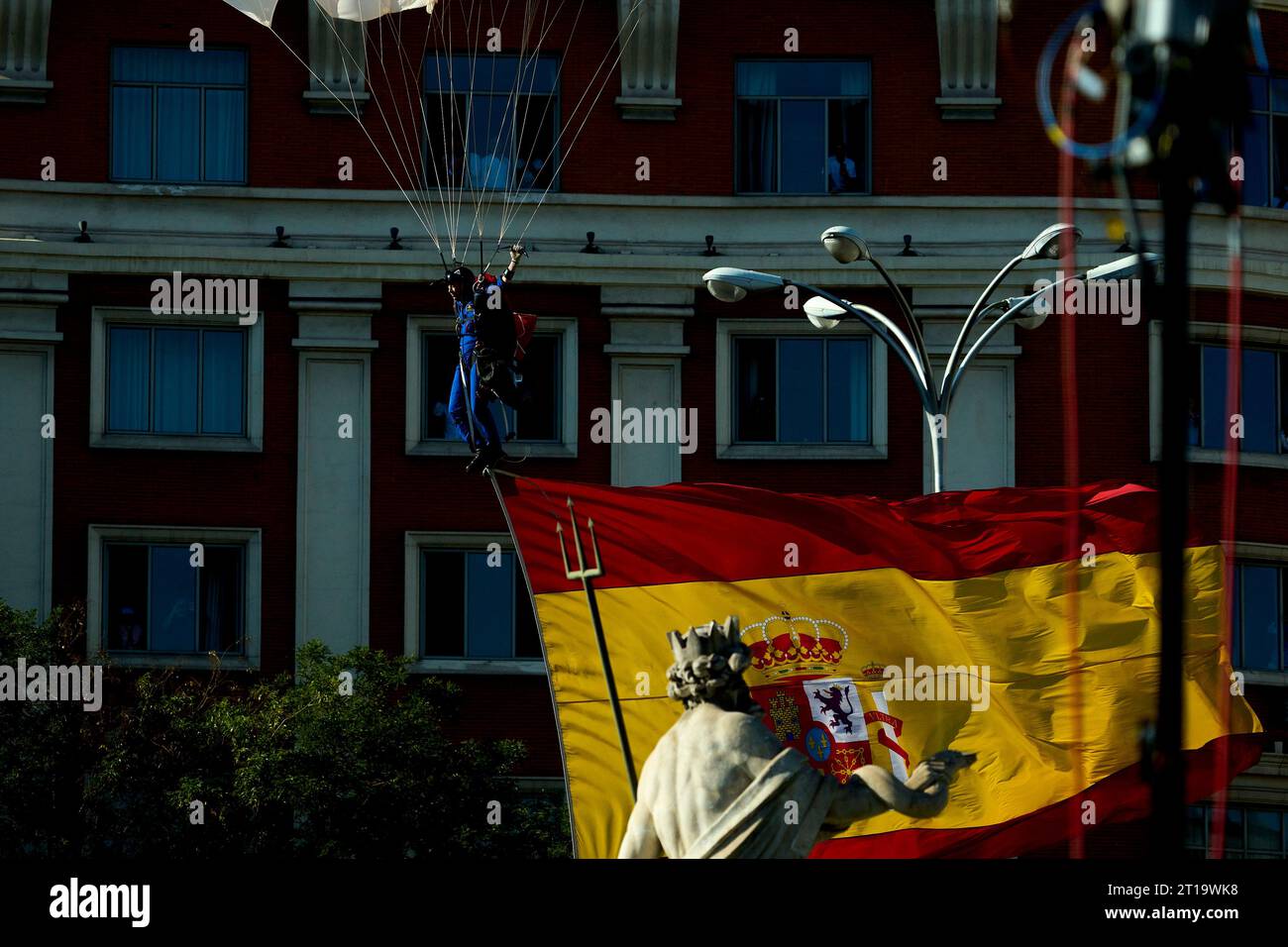 Madrid. Spain. 20231012, Parachute with spanish flag attends The