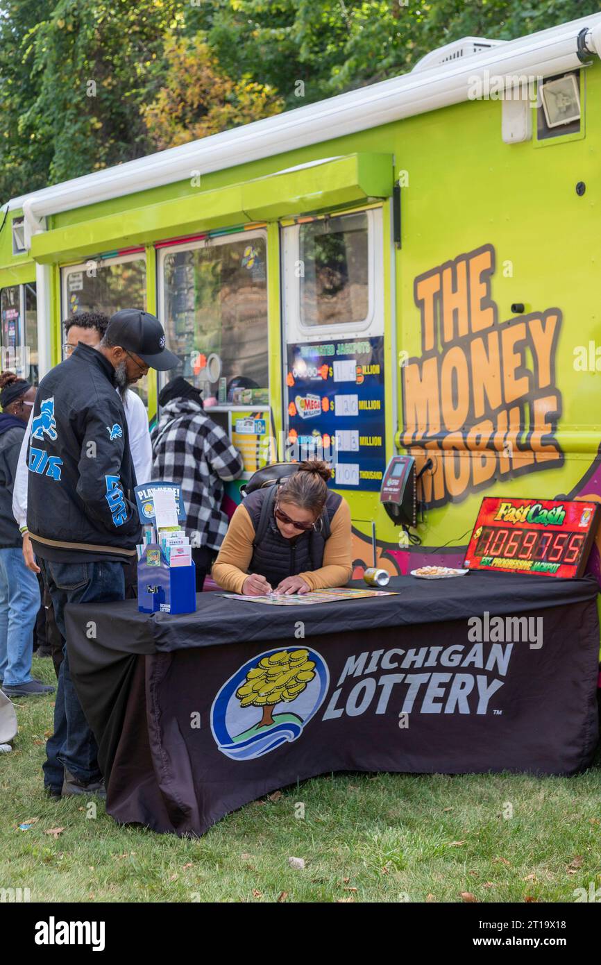 Detroit, Michigan - People play the Michigan Lottery during the Detroit Harvest Fest & Food Truck Rally. Sponsored by the Detroit Riverfront Conservan Stock Photo