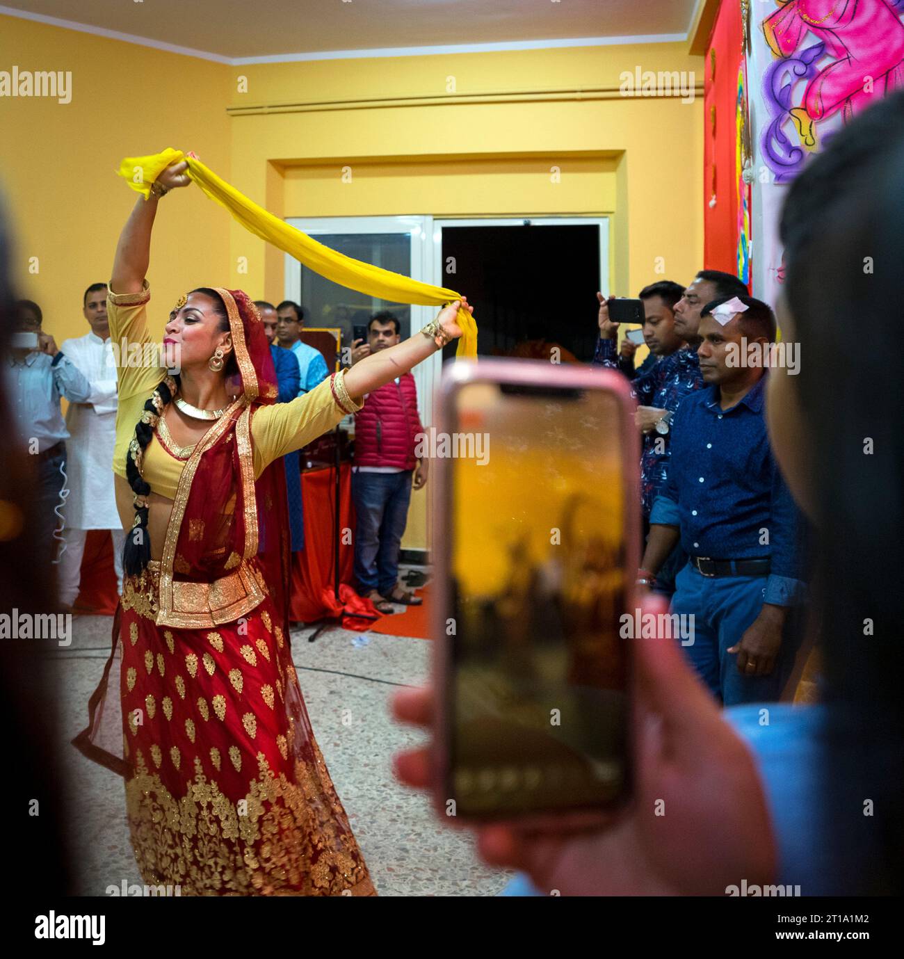 Rome,Torpignattara: celebration of the Indian holiday of Durga Puja in the roman district of Tor Pignattara,artists while they dance Stock Photo