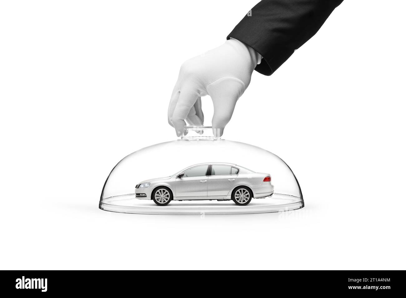 A gloved hand holding a glass dome over a car symbolizing car security and car insurance concept isolated on white background Stock Photo