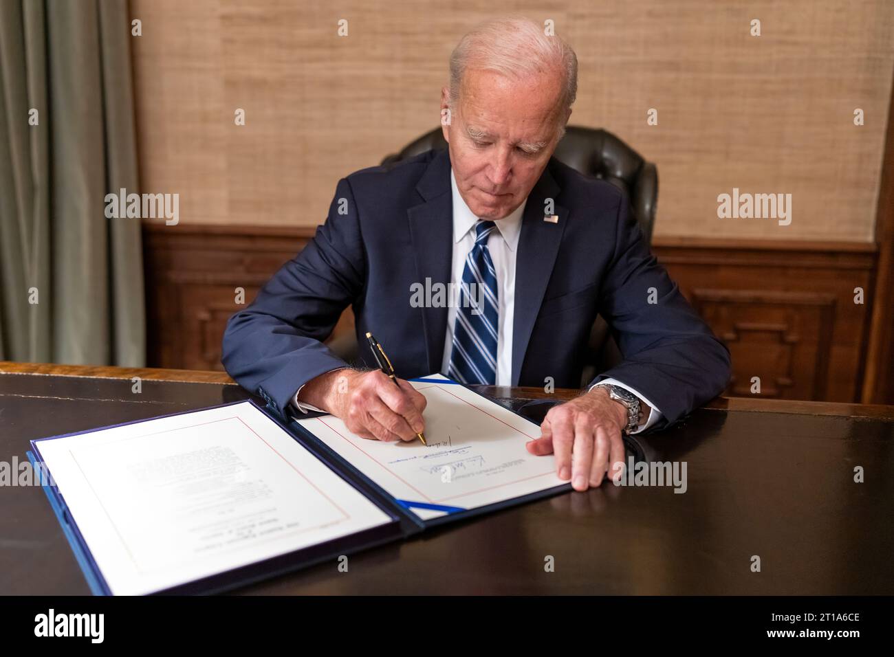 President Joe Biden signs a H.R., 5860 “Continuing Appropriations Act