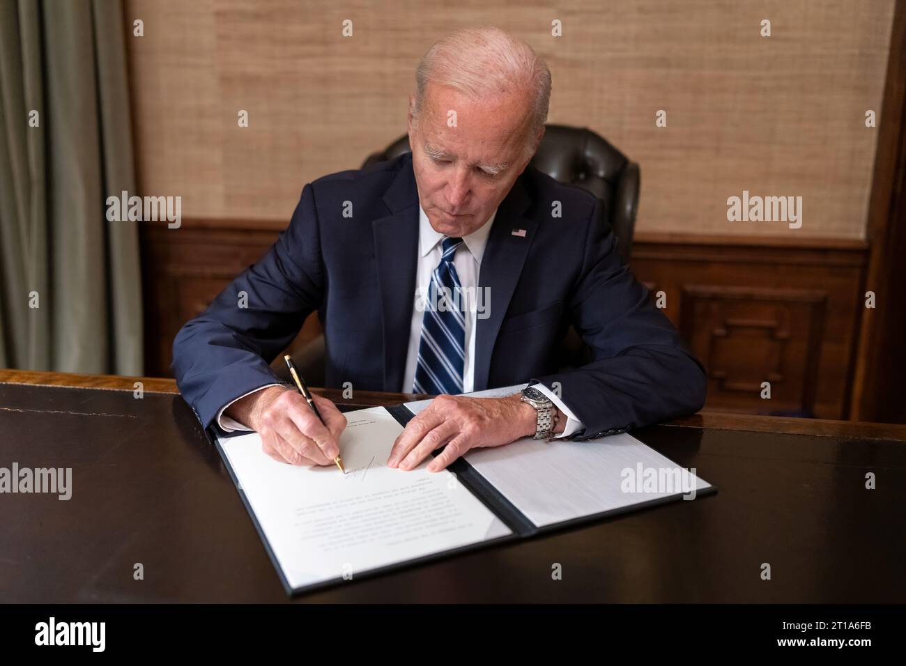 President Joe Biden signs a H.R., 5860 “Continuing Appropriations Act