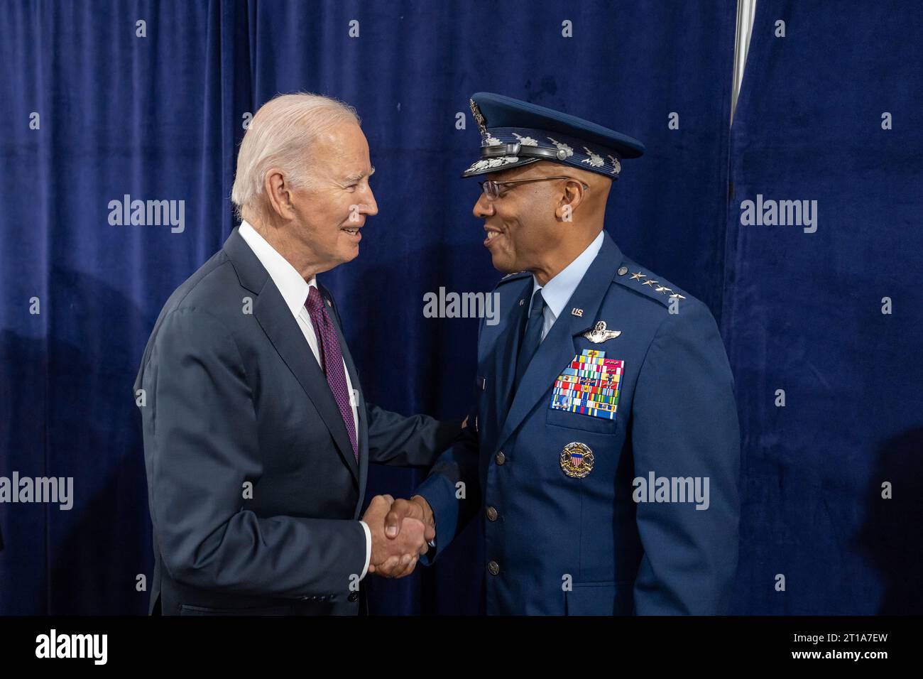 President Joe Biden greets the 21st Chairman of the Joint