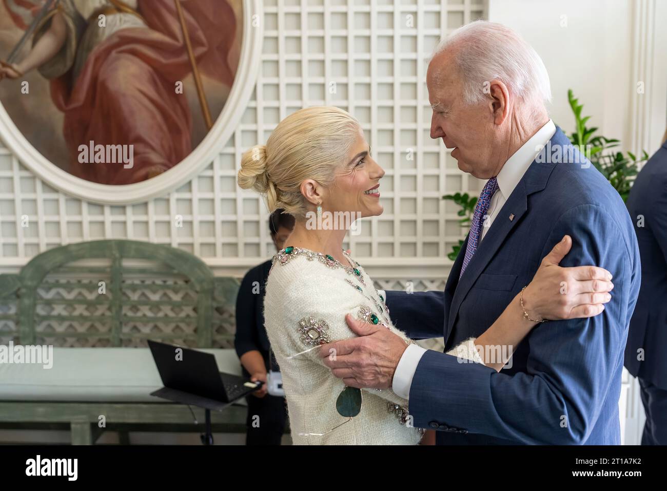 President Joe Biden greets actress and disability rights activist Selma