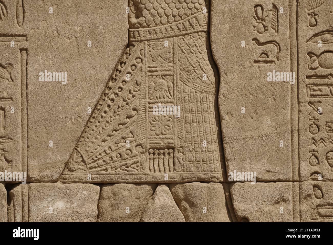 Close up of Kilt in relief work on blocks at Dendera Temple, near Qena, Egypt Stock Photo