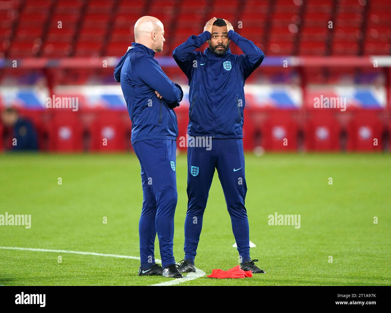 England head coach Lee Carsley (left) and coach Ashley Cole ahead of