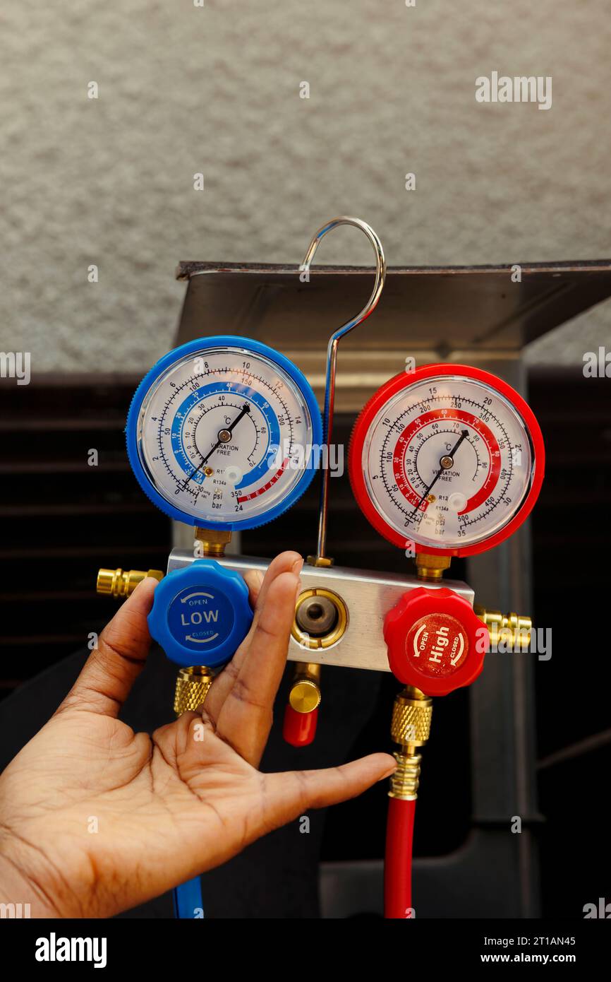 Close up of ac gauges vacuum pump able to find busted expansion valve