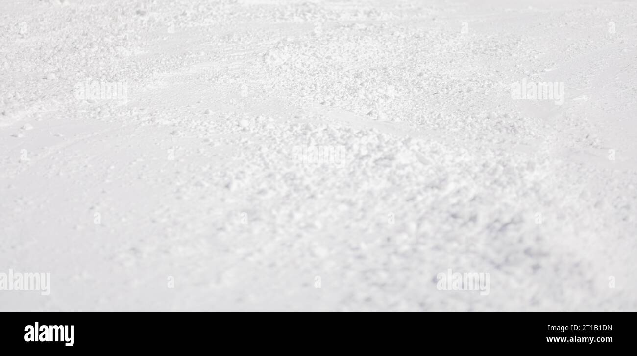 Ski slope abstract. Groomed snow background. Stock Photo