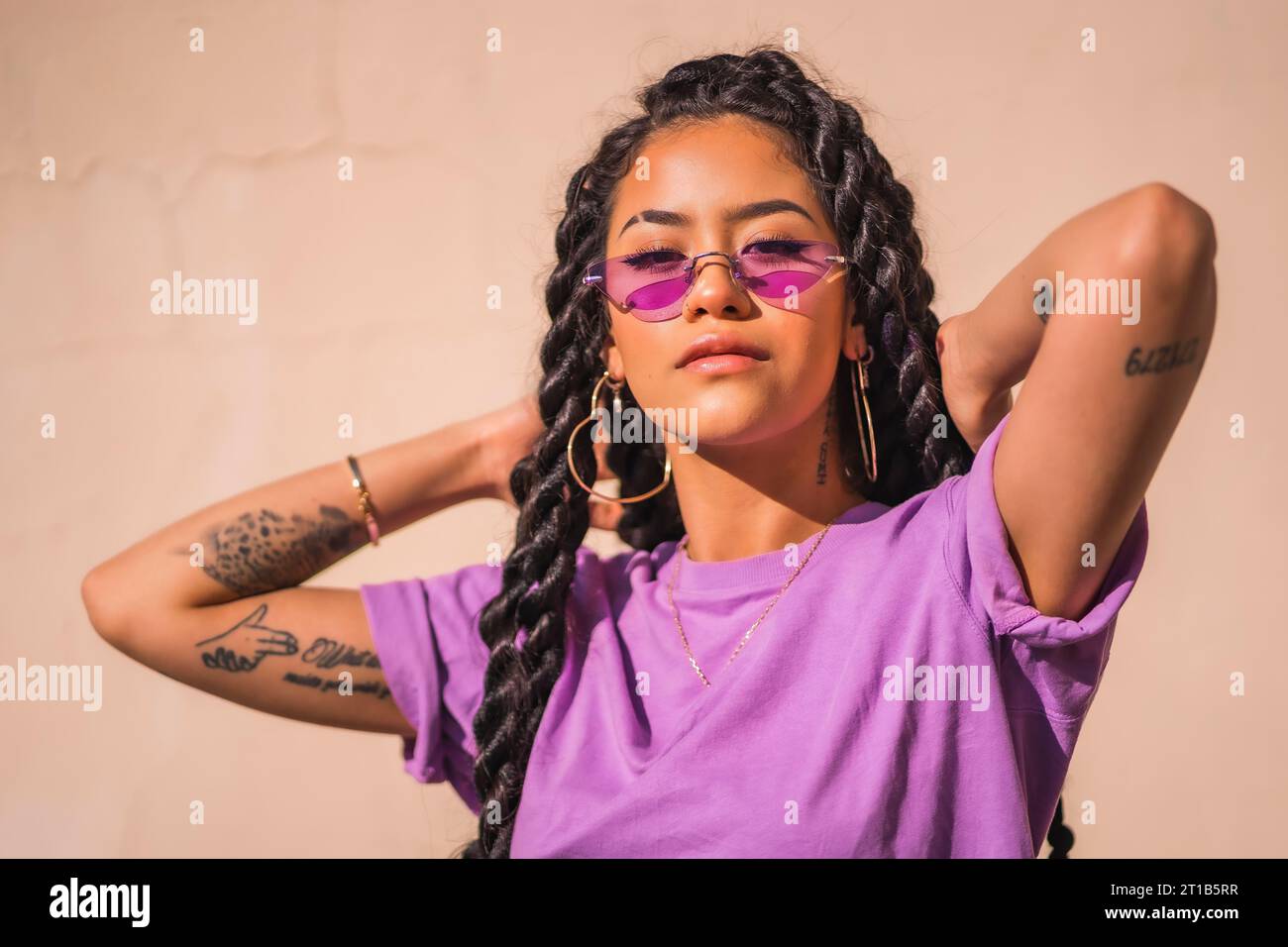 Woman wearing glasses braids hi-res stock photography and images - Alamy