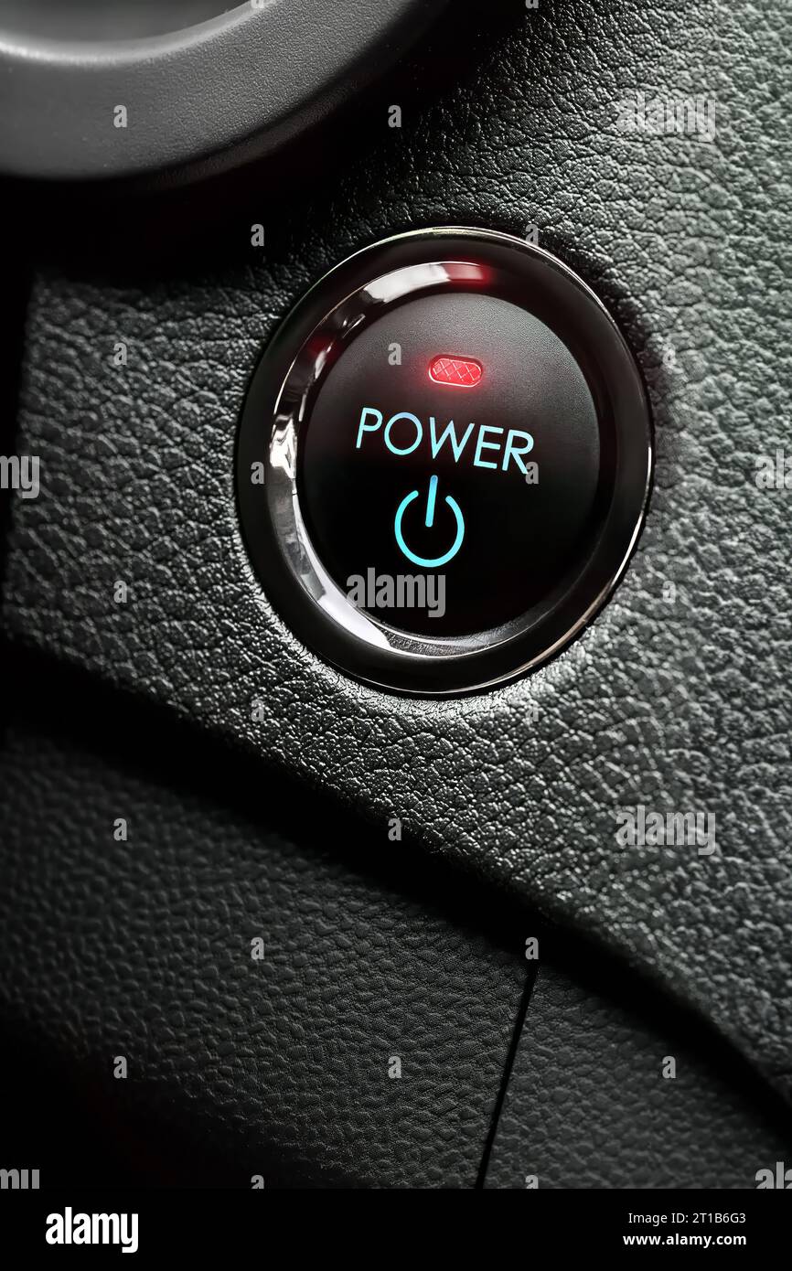 A vertical closeup of a car's pushbutton ignition switch Stock Photo Alamy
