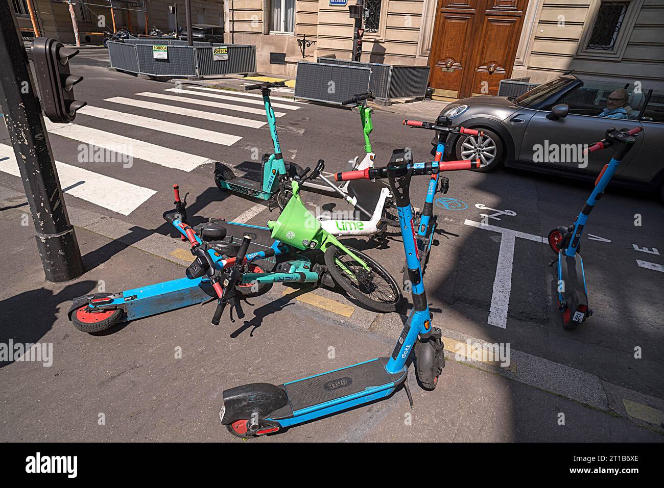Escooters thrown together after being banned by the city council, Paris, France Stock Photo Alamy
