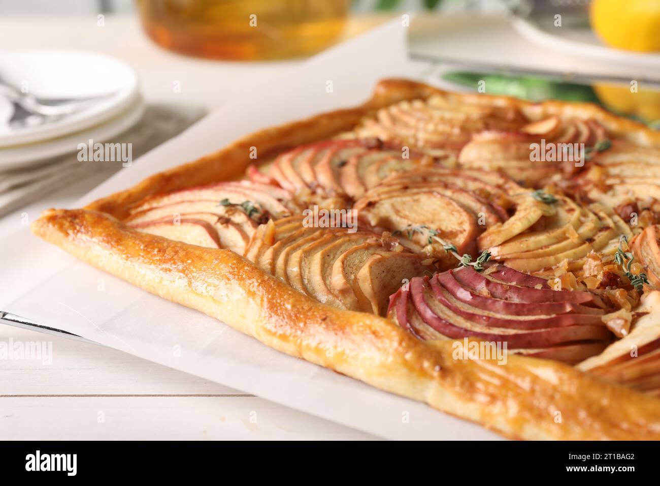 Freshly baked apple pie on white wooden table, closeup Stock Photo
