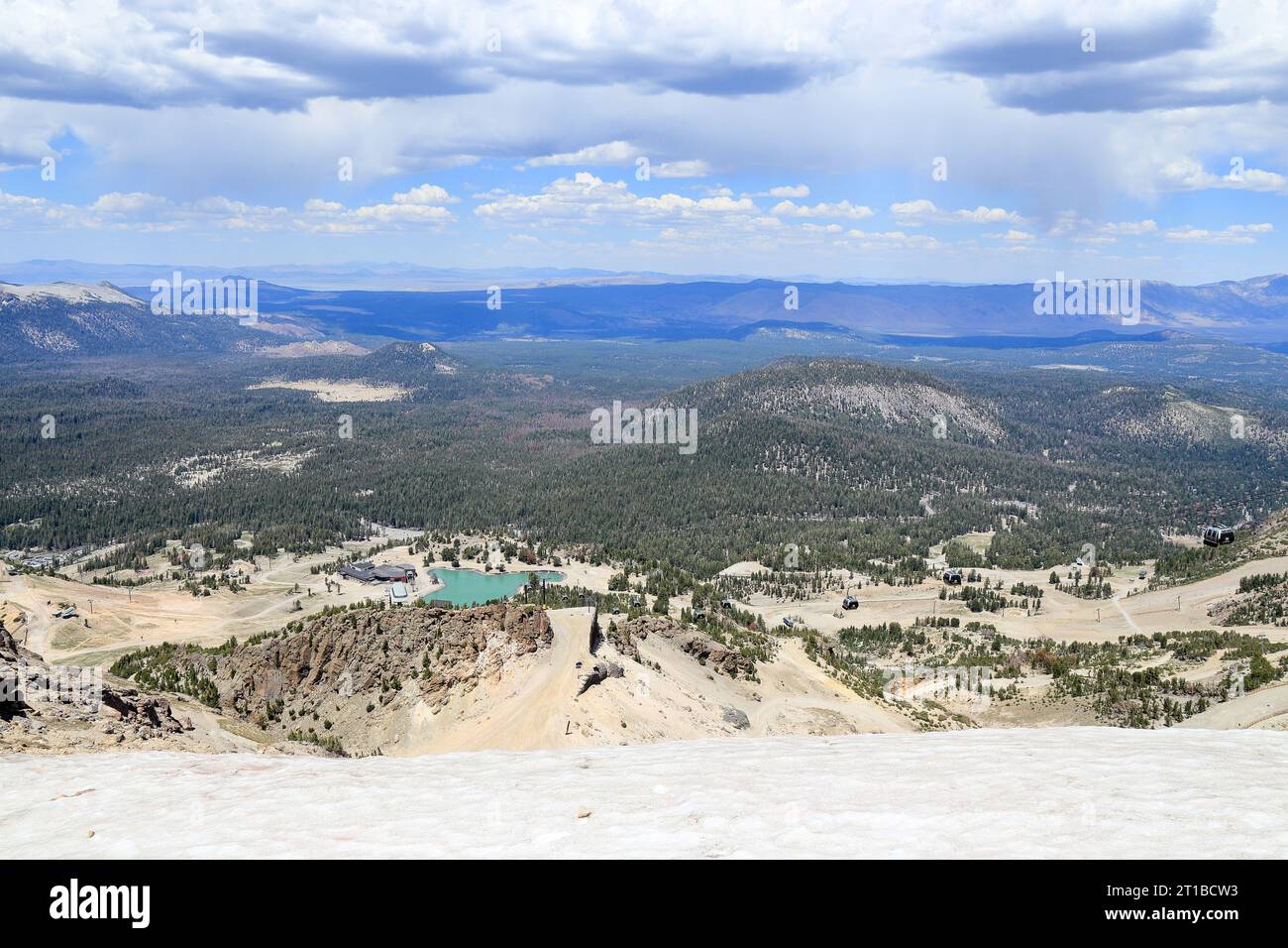 A vast view from a  gondolas coming up to the top of Mammoth mountain in Mammoth Lakes, California during a summer time. Stock Photo