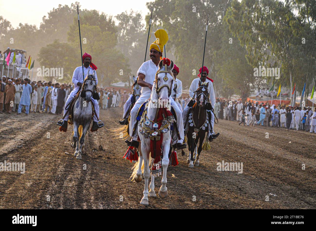 Islamabad, Pakistan. 12th Oct, 2023. Pakistani horsemen charge on a ...