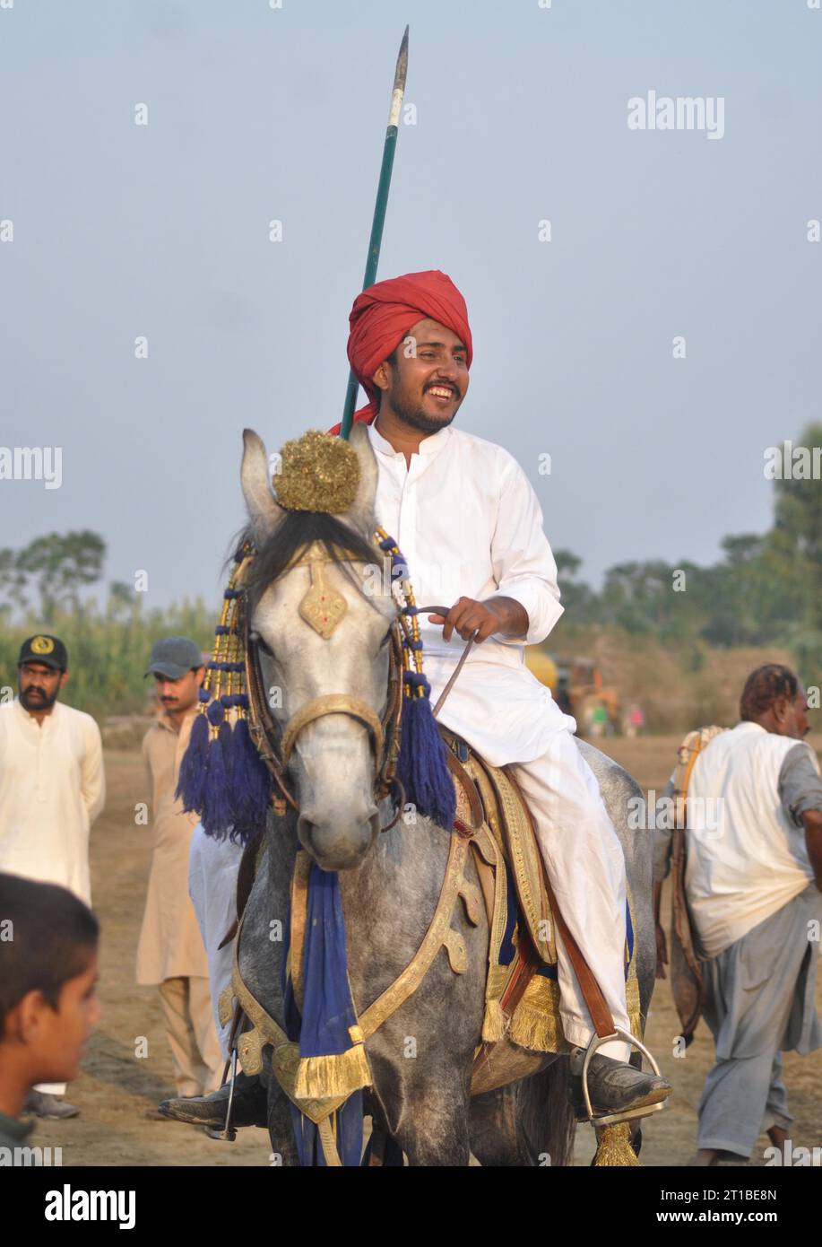 Islamabad, Pakistan. 12th Oct, 2023. Pakistani horsemen charge on a ...