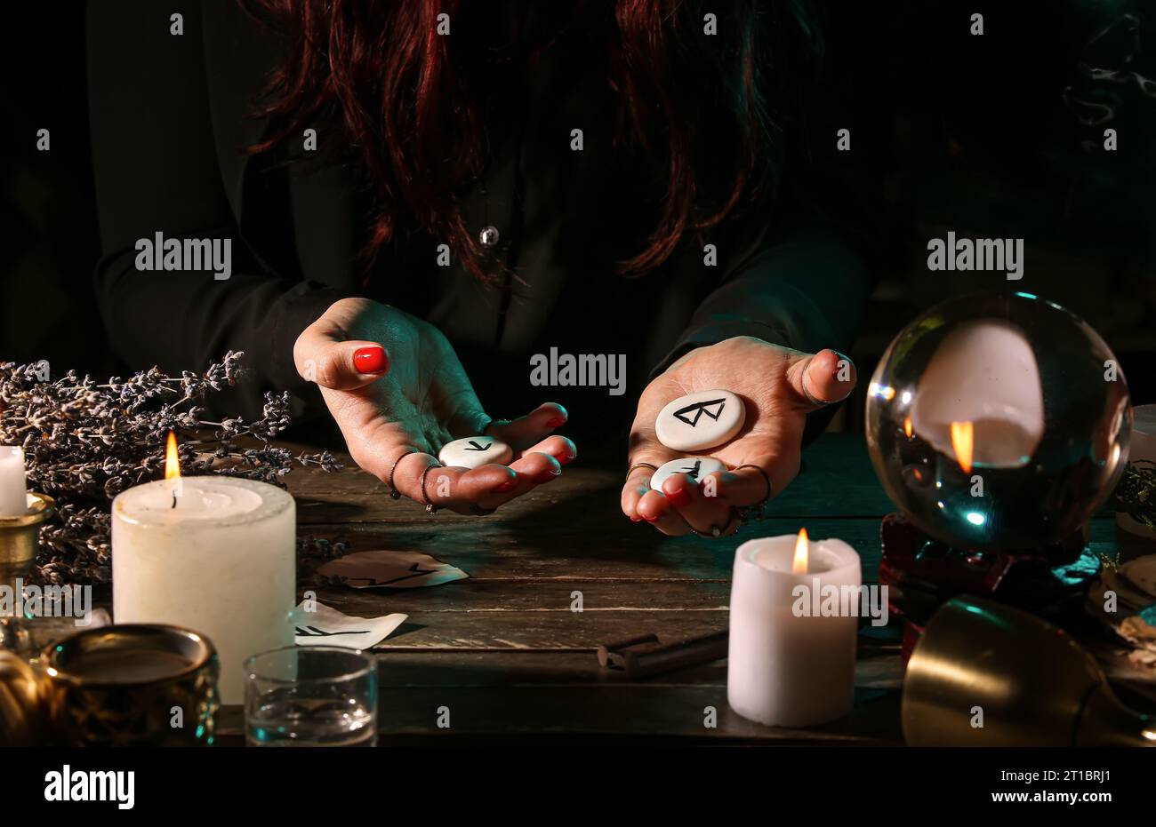 Outward Rune Table Woman black runes table hi-res stock photography and images - Alamy